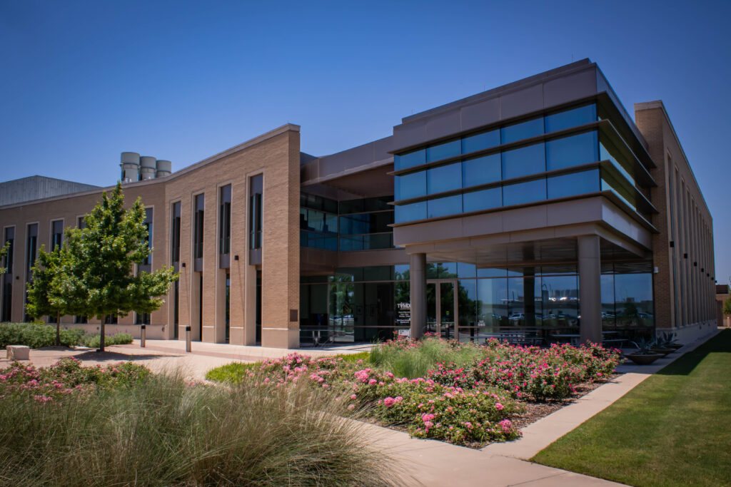 college station lab building with green grass in front