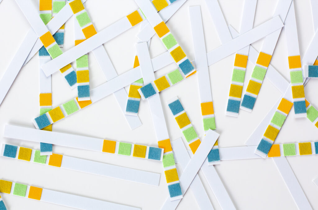 Abstract white background with colored ph paper